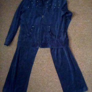 Velour pants and zip up jacket.